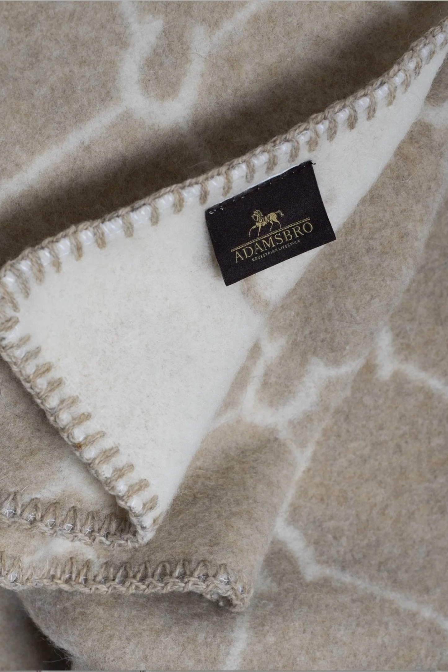 Merino throw beige Adamsbro